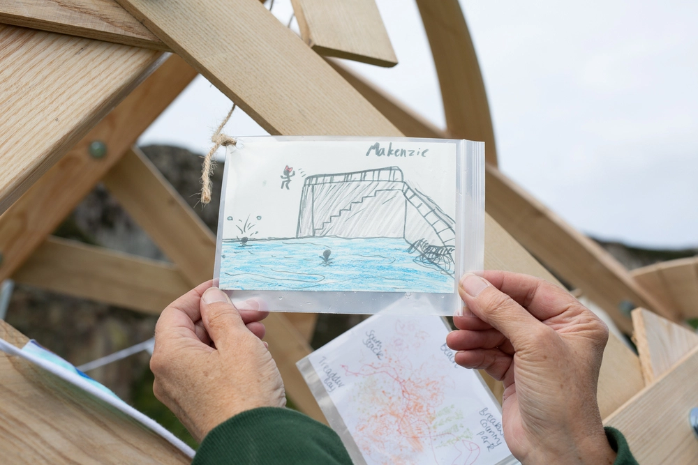 Front of postcard by , age 