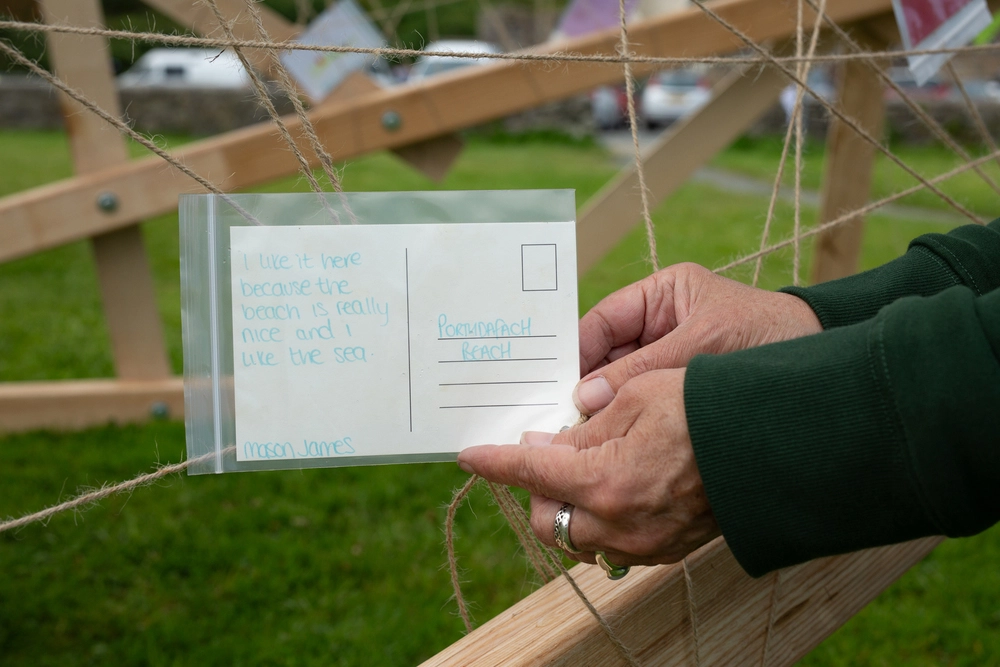 Back of postcard by , age 