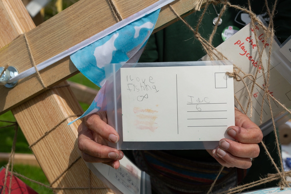 Back of postcard by , age 