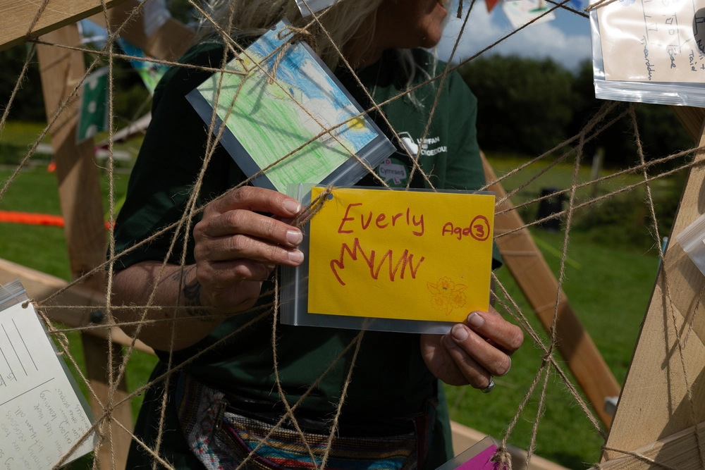 Back of postcard by , age 