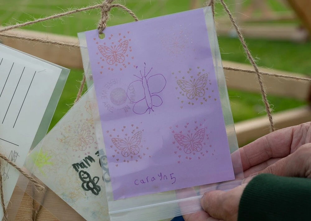 Front of postcard by , age 