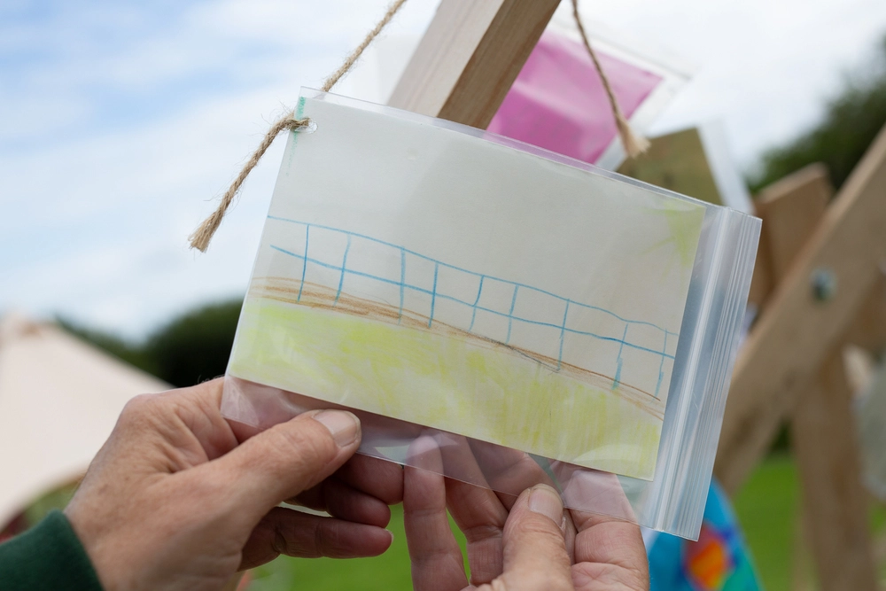 Front of postcard by , age 