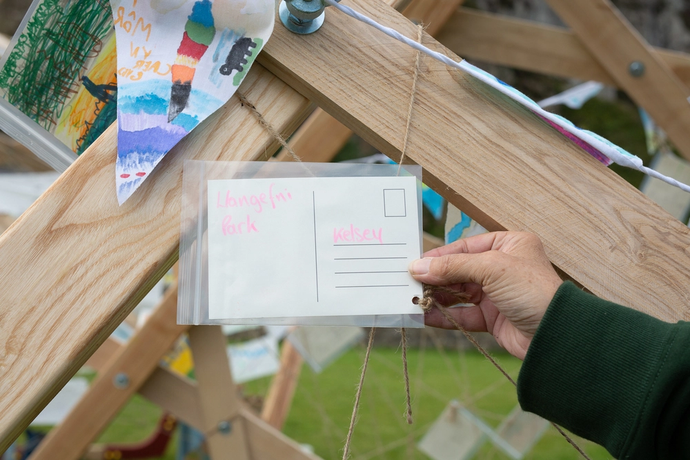 Back of postcard by , age 