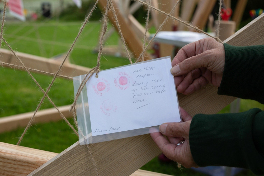 Back of postcard by , age 