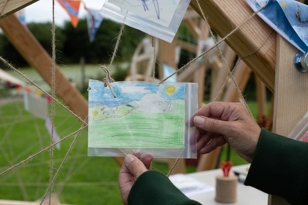 Front of postcard by , age 