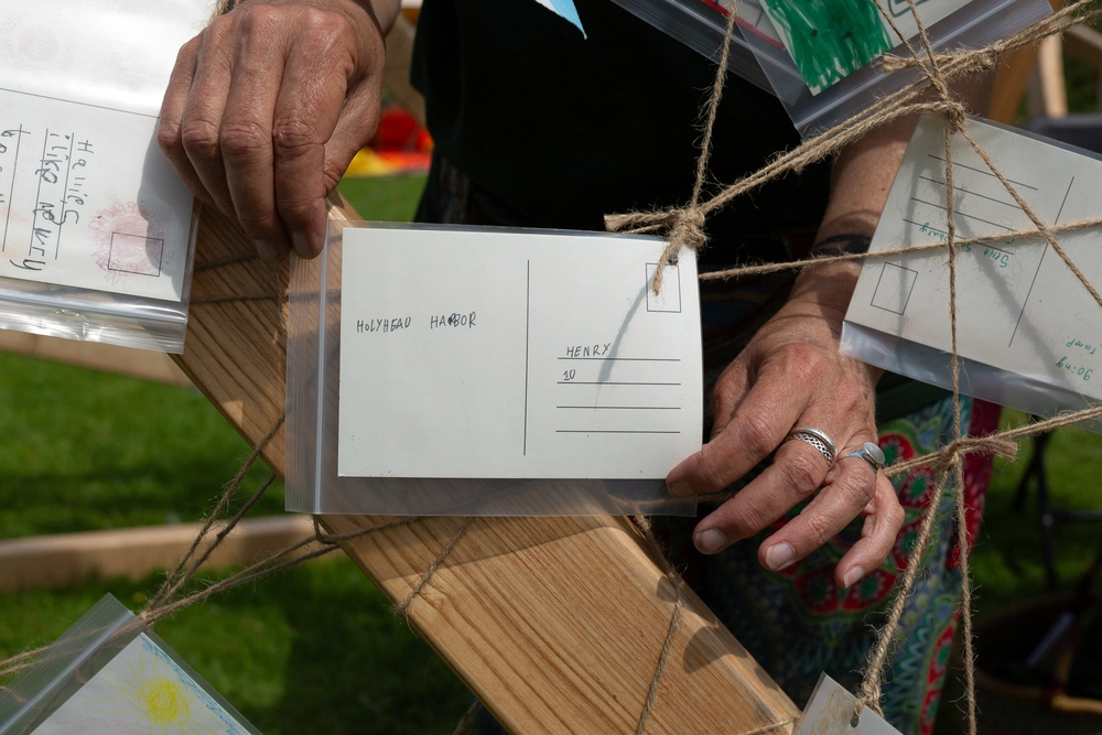 Back of postcard by , age 