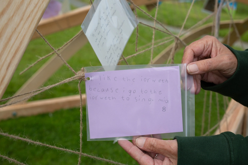 Back of postcard by , age 