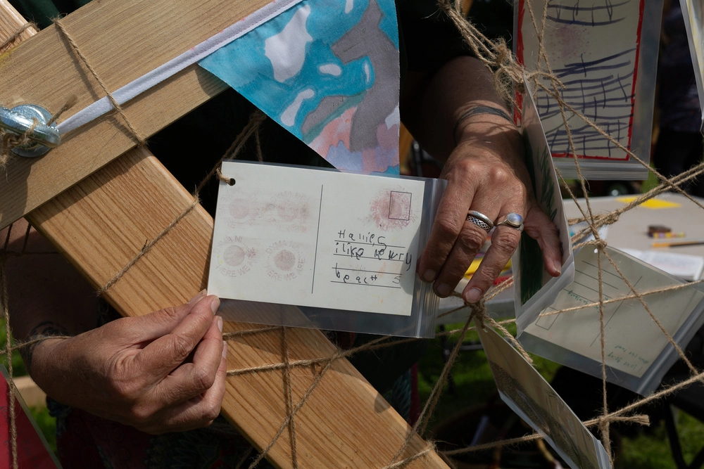 Back of postcard by , age 