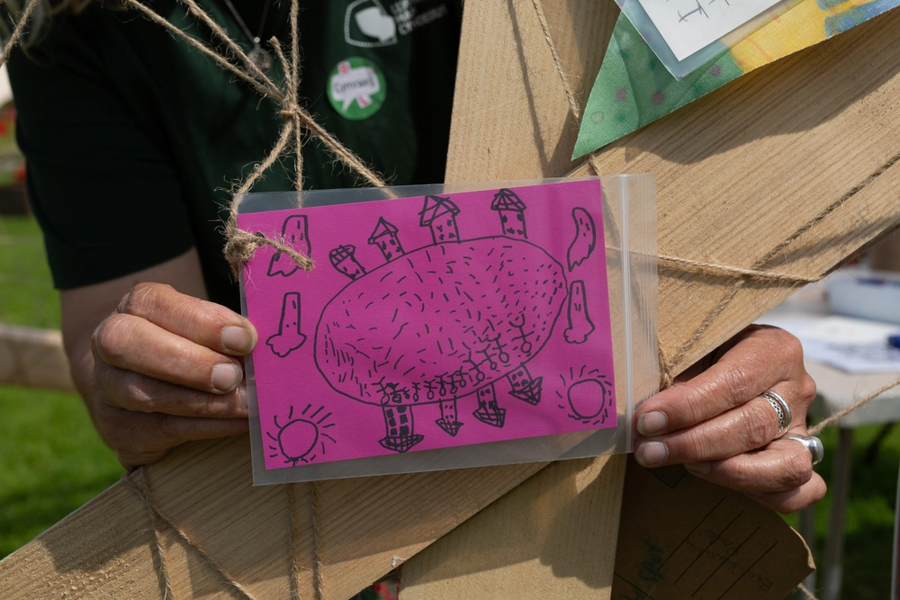 Front of postcard by , age 