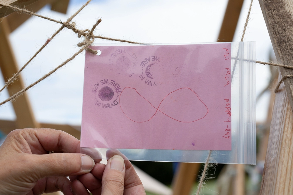 Back of postcard by , age 