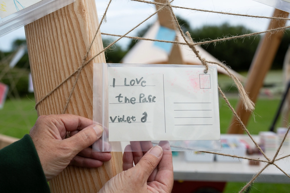 Back of postcard by , age 