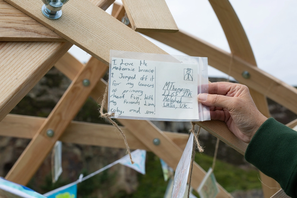 Back of postcard by , age 