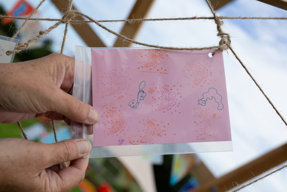 Front of postcard by , age 