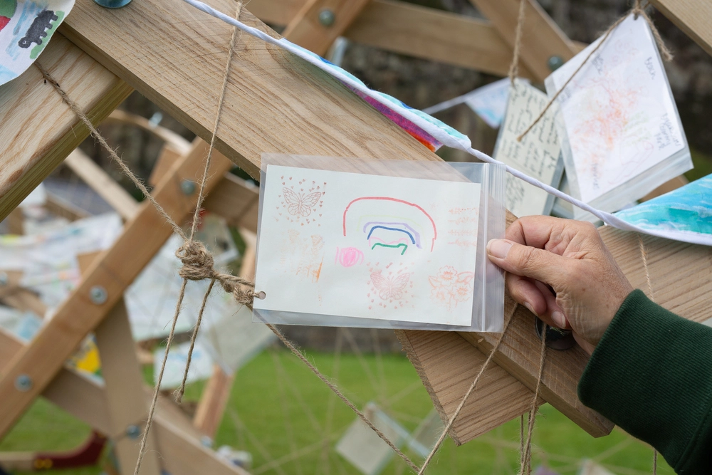 Front of postcard by , age 