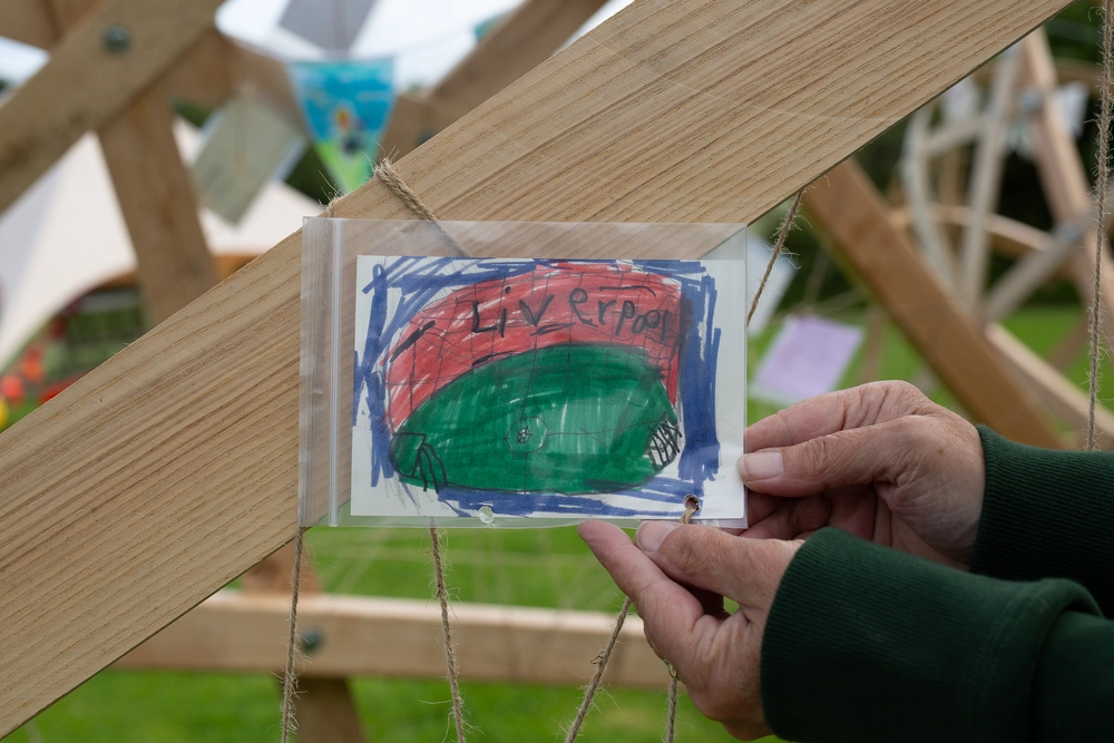 Front of postcard by , age 