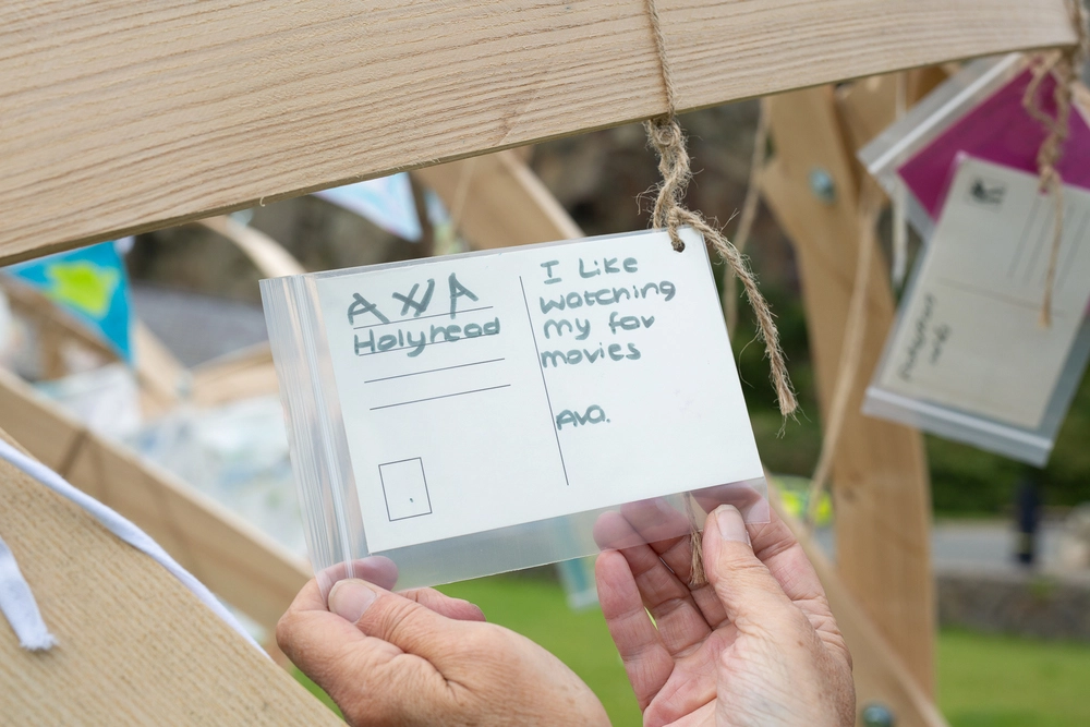 Back of postcard by , age 