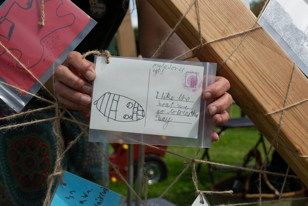 Back of postcard by , age 