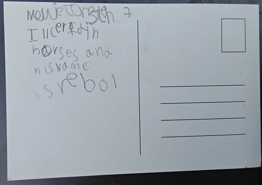 Back of postcard by , age 