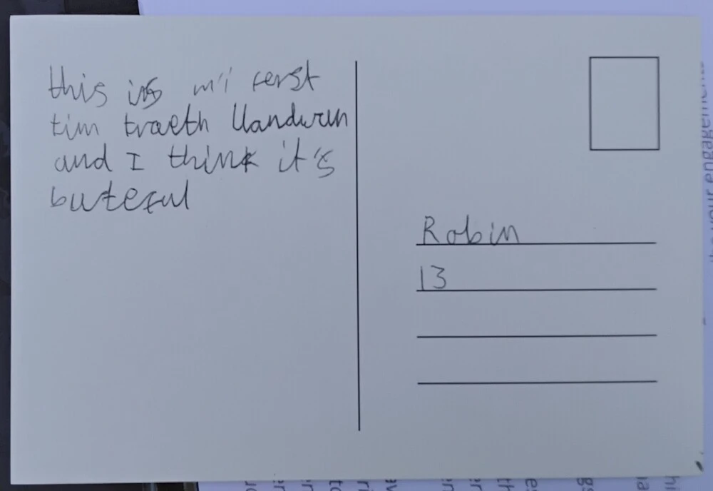 Back of postcard by , age 