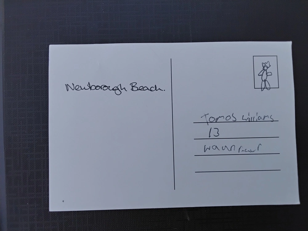 Back of postcard by , age 