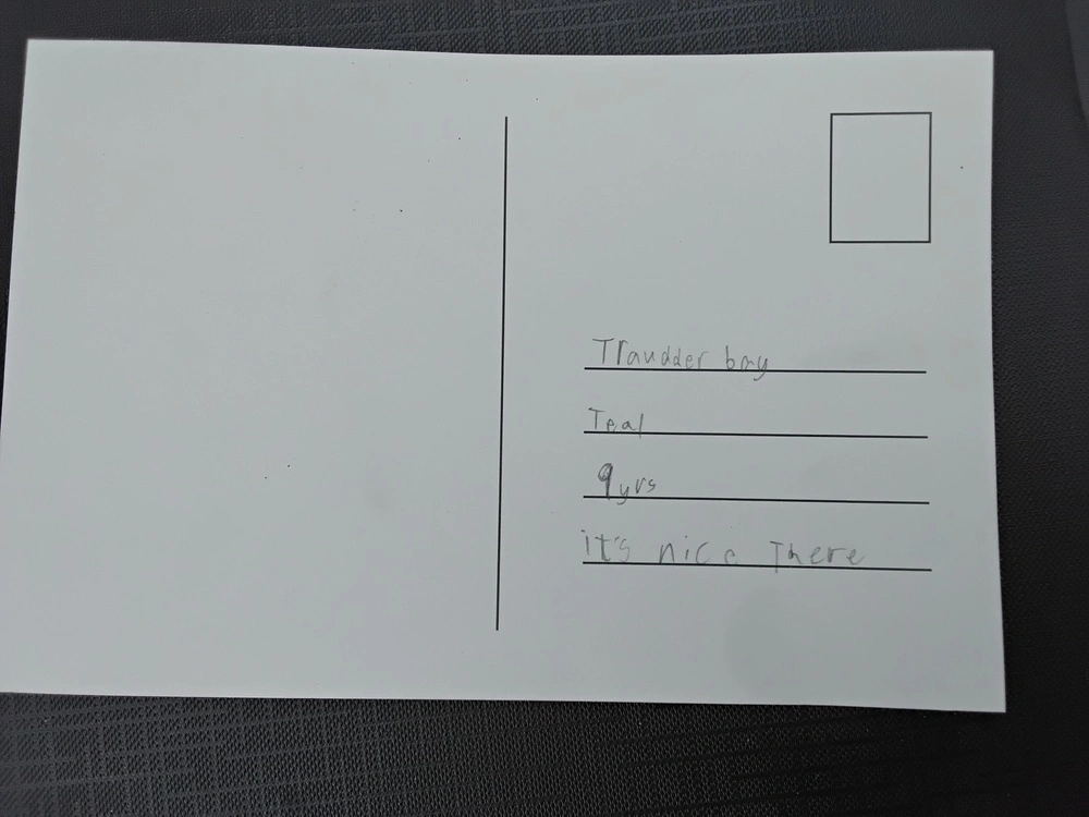 Back of postcard by , age 