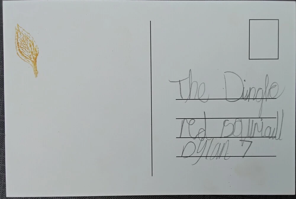 Back of postcard by , age 