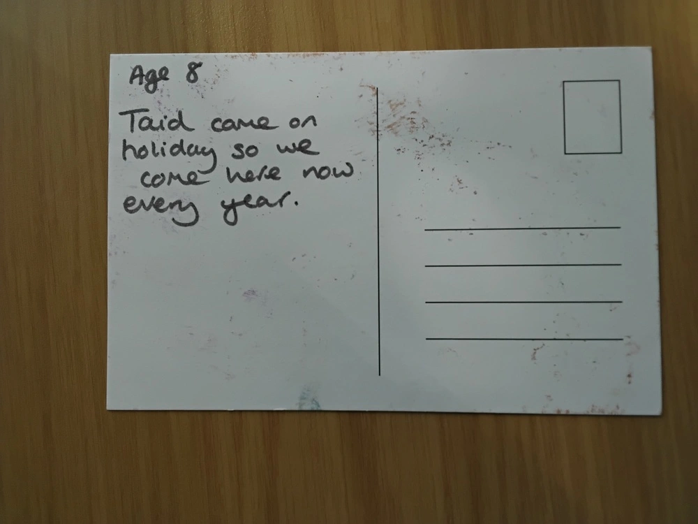 Back of postcard by , age 