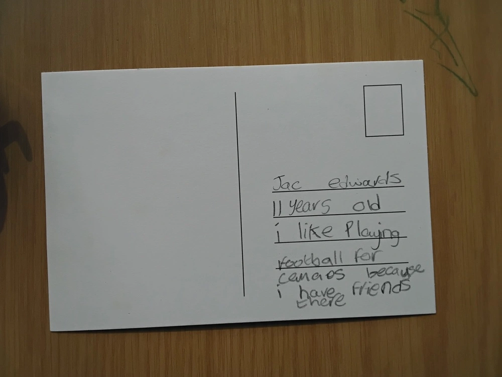 Back of postcard by , age 