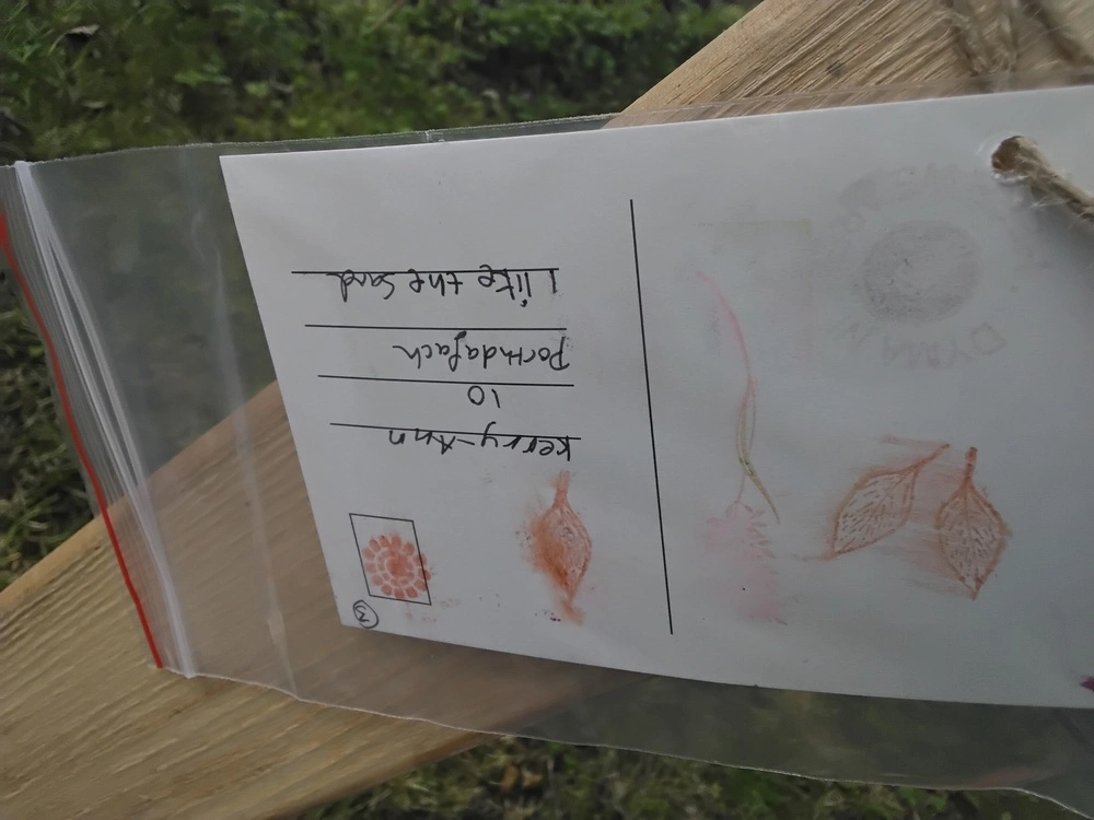 Back of postcard by , age 