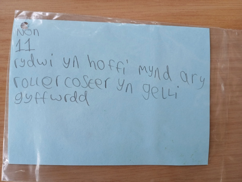 Back of postcard by , age 