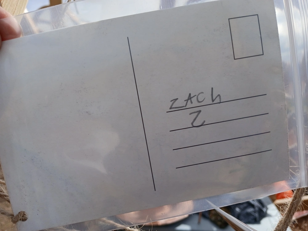 Back of postcard by , age 