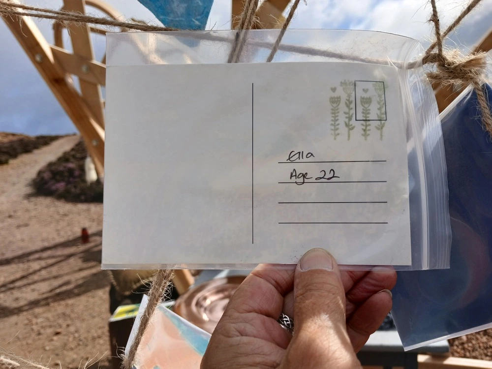 Back of postcard by , age 