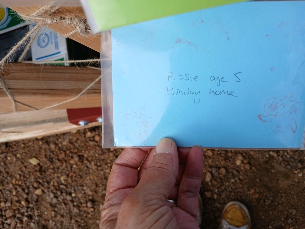 Back of postcard by , age 