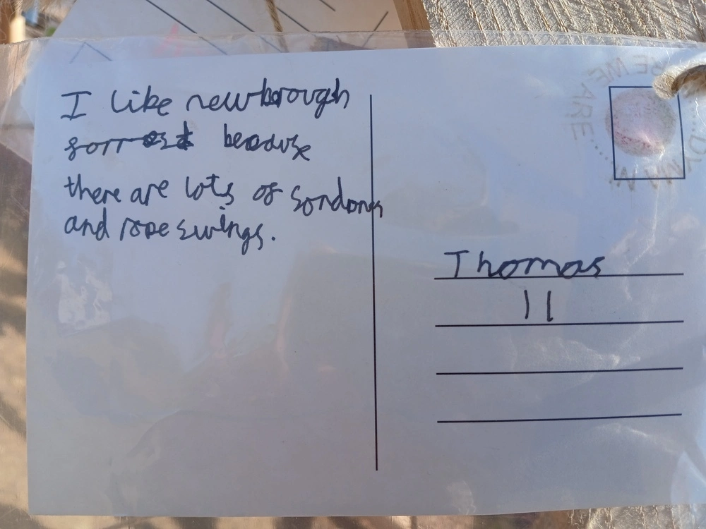 Back of postcard by , age 