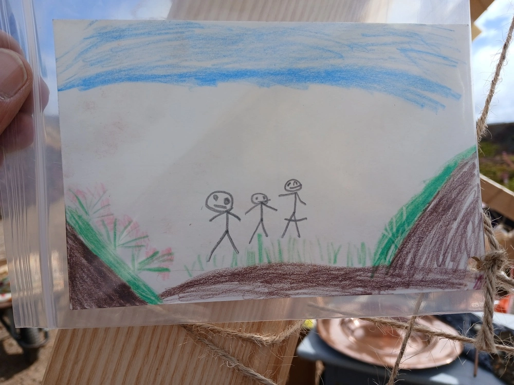 Front of postcard by , age 